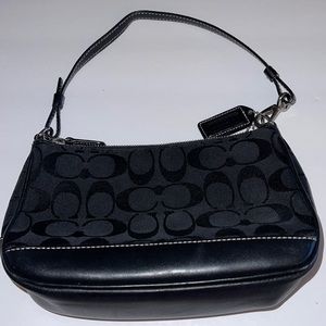 Coach signature “C” canvas clutch, excellent condition. Fits iPhone 12 max